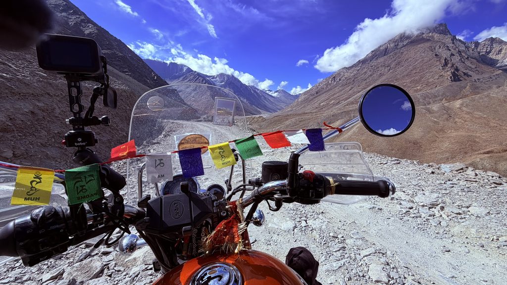 Riders navigating dusty and rough terrain in Spiti
