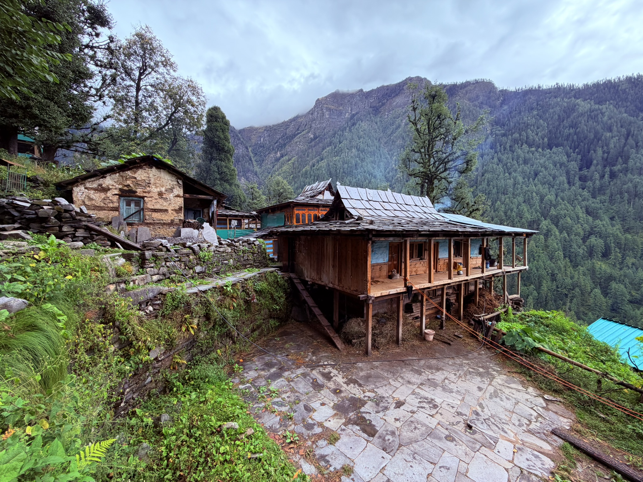 Traditional wooden houses in Jakha Hanging Village