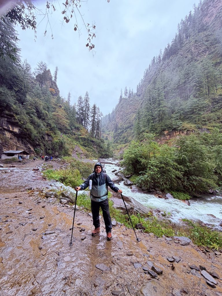 Muddy and slippery mountain trail on the Rupin Pass trek after rain in September.